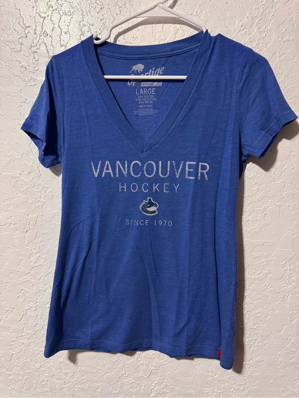 Women's Vancouver Canucks Blue Sportique V-Neck T-Shirt